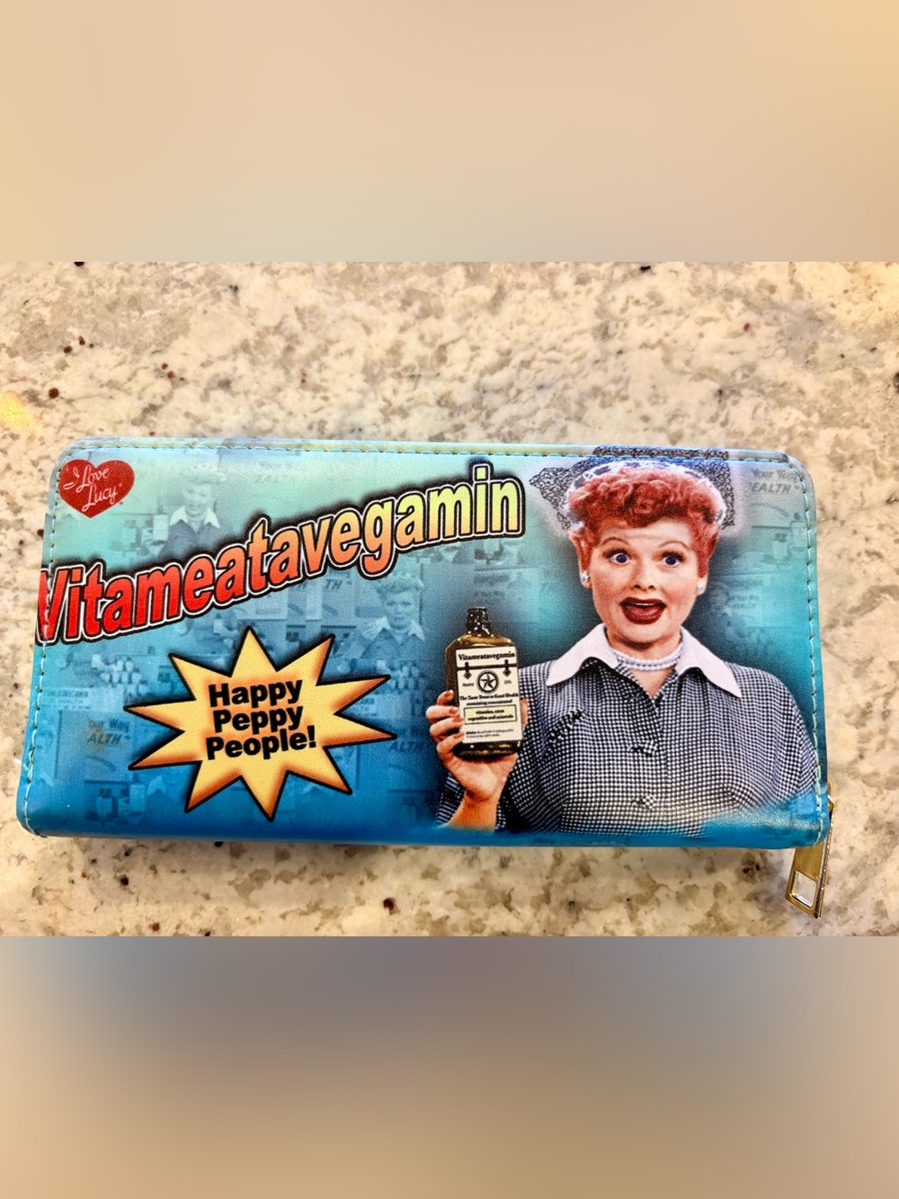 Blue Novelty Zip Wallet with Retro Vitameatavegamin Design